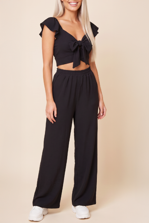 Ljetni ženski set od dva dijela široke hlače i crop top s vezicama SVENSELA BLACK, Boja: crna, IVET.HR - MODERNA ODJEĆA